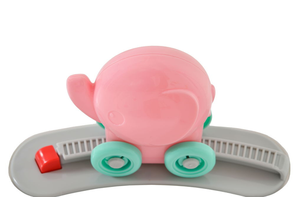 Moni MAGIC FUN Baba ugráló pasztel játékkal pink