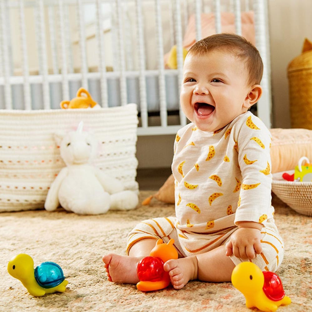 Munchkin fürdõjáték Bath Rattle Squirts 2db csörgõ-spriccelõ – fürdetési kiegészítő